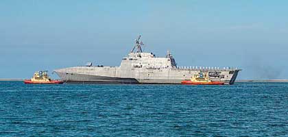 SAN DIEGO (July 5, 2017) The littoral combat ship USS Gabrielle Giffords (LCS 10) transits San Diego Bay to arrive at the ship's homeport of Naval Base San Diego. Gabrielle Giffords is the newest Independence-variant littoral combat ship and one of seven littoral combat ships homeported in San Diego. U.S. Navy photo by MCSN Nicholas Burgains