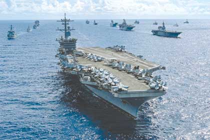 Air craft carrier USS Abraham Lincoln leads the way during a RIMPAC exercise.