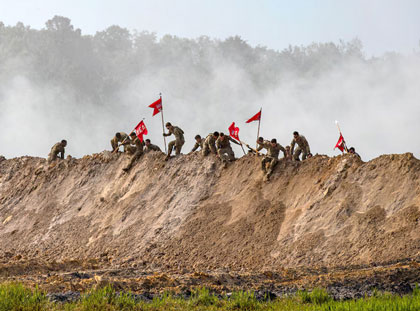 Conquer the Climb: Soldiers assigned to the 92nd Engineer Battalion, 3rd Infantry Division, participate in Seize the Marne during Salute to Summer at Fort Stewart, Ga., June 27, 2025. The event highlighted the division's emphasis on physical fitness, discipline and mutual support. US Army photo by Spc. Rebeca Soria. 